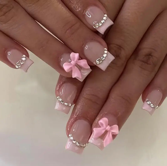 Bows and rhinestone Nails