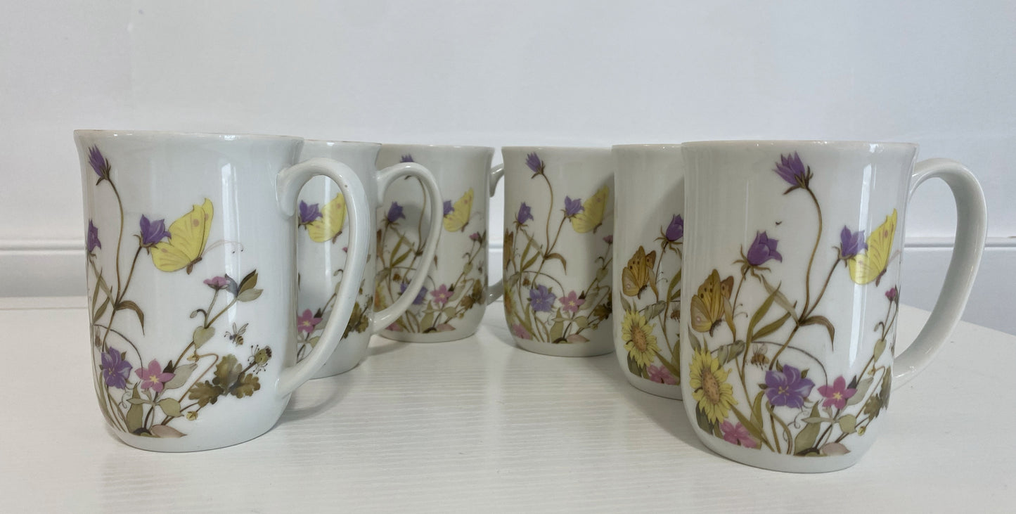Nature Garden Society Fine China, Enesco, Elegant, Fine dining, Premium quality, Botanical, Floral patterns, Delicate, Tableware, Collectible, Nature-inspired, Sophisticated, Artistic, Tea party, Garden theme, High-end, Porcelain, Exquisite craftsmanship, Whimsical, Timeless