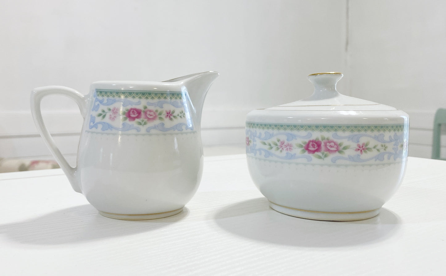 Floral sugar bowl and creamer set