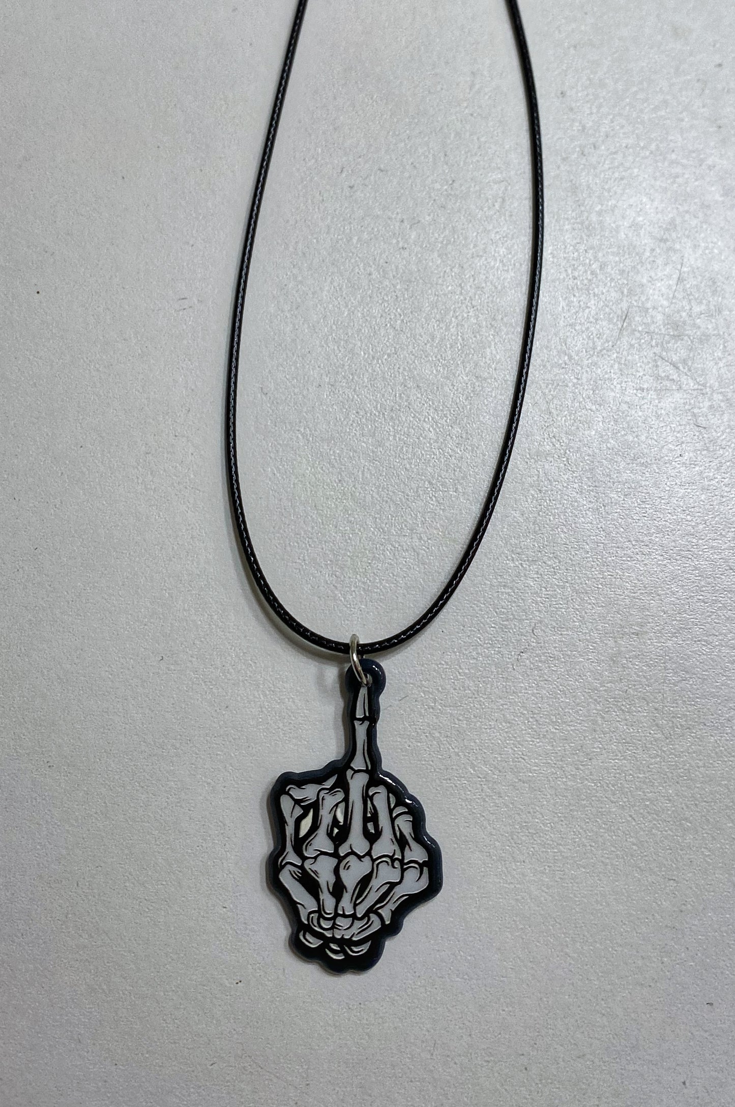 Middle finger necklace