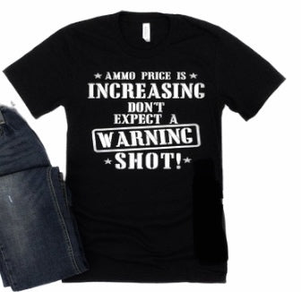  T-shirt, Ammo, Price increase, Gun control, Statement tee, Graphic tee, Protest wear, Sociopolitical, Conversation starter, Economic commentary, Activism, Current events, Second Amendment, Firearms, Political statement, Fashion activism, Gun rights, Cost of ammunition, Social awareness, Protest fashion