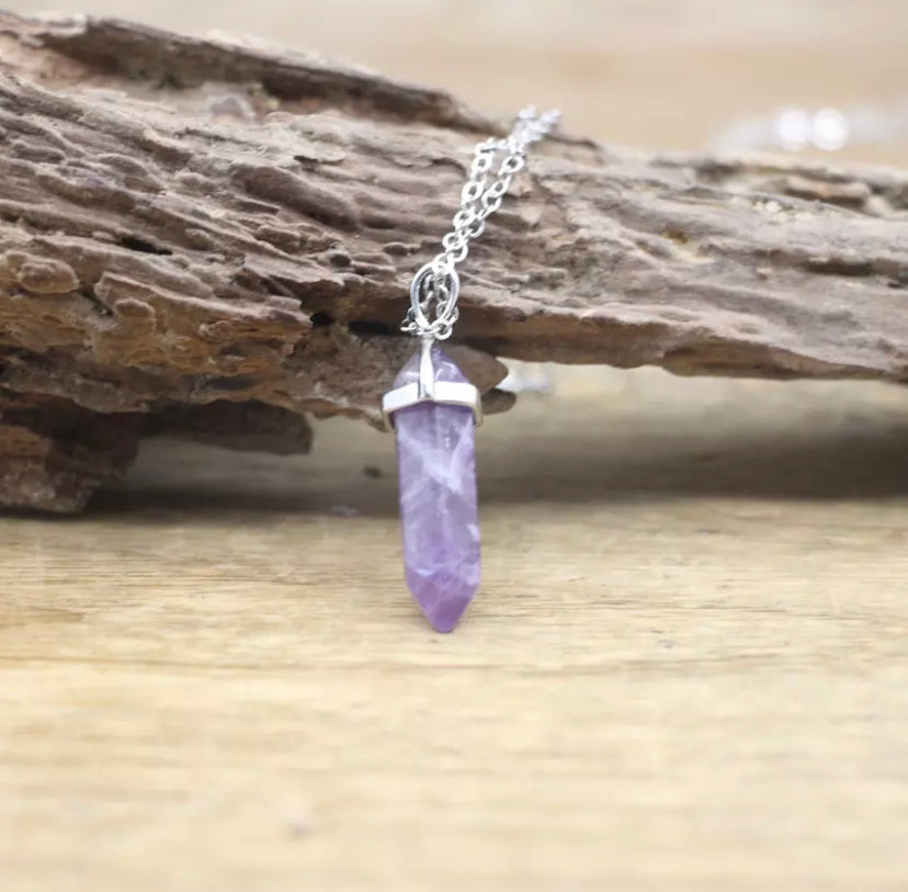 Amethyst, Necklace, Purple gemstone, Jewelry, Pendant, Elegant, Regal, Birthstone, Statement, Handcrafted, Sterling silver, Dainty, Sparkling, Delicate, Gemstone necklace, Fashion, Healing properties, Sophisticated, Natural beauty, Timeless