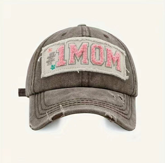 Mom Hat, Black, Stylish, Versatile, Adjustable, Comfortable, Durable, Classic, Modern, Fashionable, Everyday wear, Sun protection, Breathable, Functional, Sophisticated, Adjustable strap, Shade, Ventilation, Resilient, Symbolic