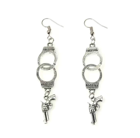 Pistol and handcuff earrings