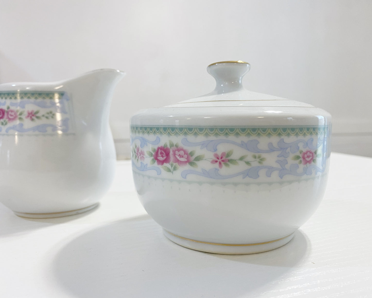 Floral sugar bowl and creamer set