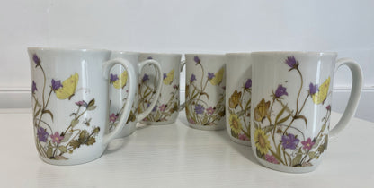 Nature Garden Society Fine China, Enesco, Elegant, Fine dining, Premium quality, Botanical, Floral patterns, Delicate, Tableware, Collectible, Nature-inspired, Sophisticated, Artistic, Tea party, Garden theme, High-end, Porcelain, Exquisite craftsmanship, Whimsical, Timeless