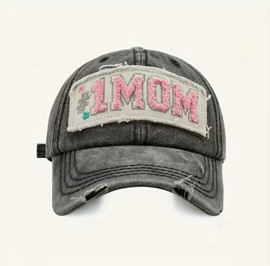 Mom Hat, Black, Stylish, Versatile, Adjustable, Comfortable, Durable, Classic, Modern, Fashionable, Everyday wear, Sun protection, Breathable, Functional, Sophisticated, Adjustable strap, Shade, Ventilation, Resilient, Symbolic