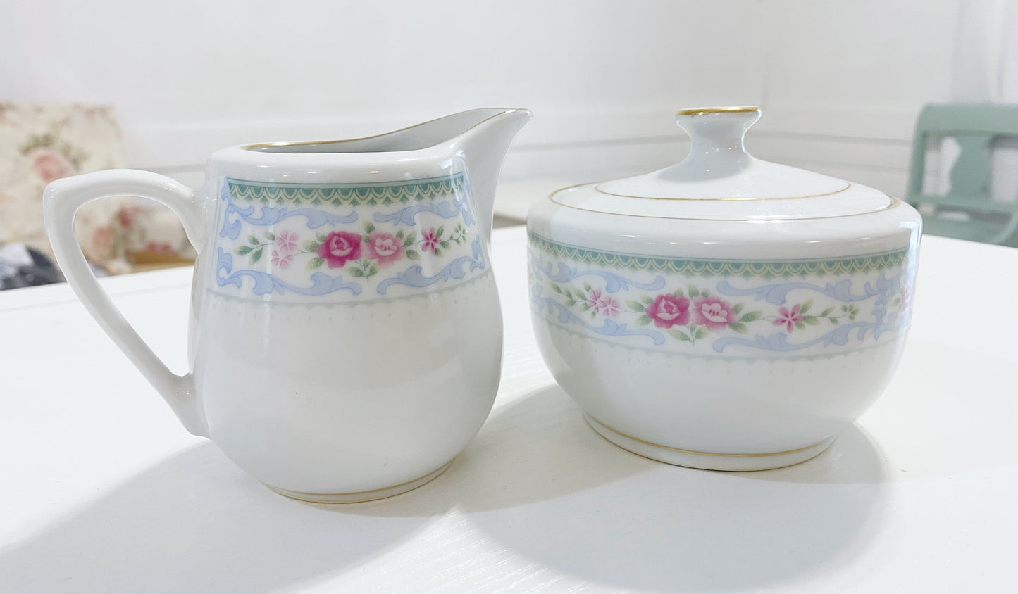 Floral sugar bowl and creamer set