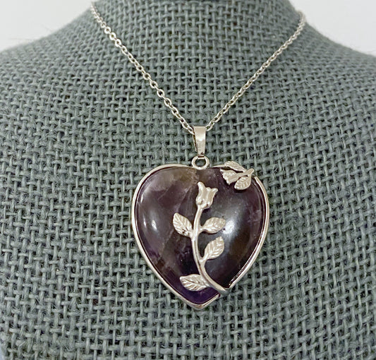  Amethyst necklace, Flower pendant, Gemstone jewelry, Purple amethyst, Floral design, Nature-inspired necklace, Statement jewelry, Elegant accessory, Dainty chain, Fashion necklace, Faceted gemstone, Romantic jewelry, Delicate craftsmanship, Sparkling amethyst, Feminine charm, Regal purple, Special occasion accessory, Handcrafted pendant, Exquisite detailing, Timeless beauty